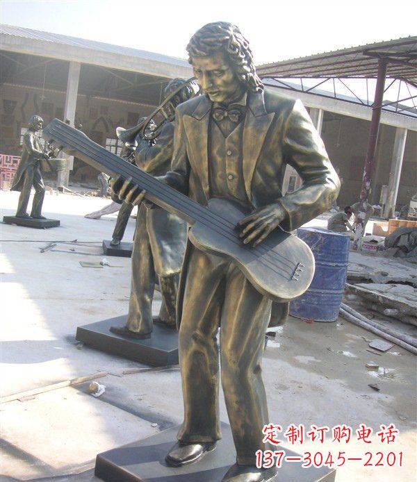 盐城西方人物铜吉他雕塑