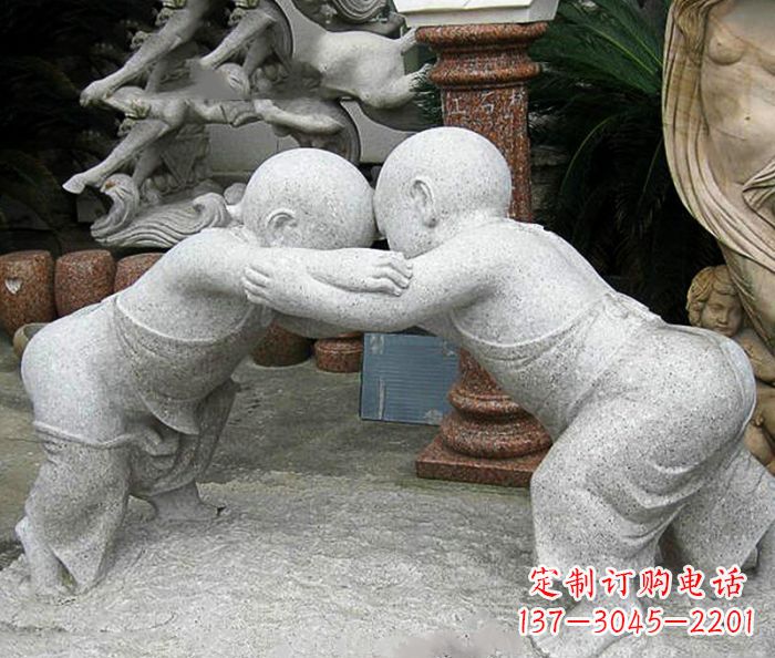 盐城可爱小孩摔跤石雕