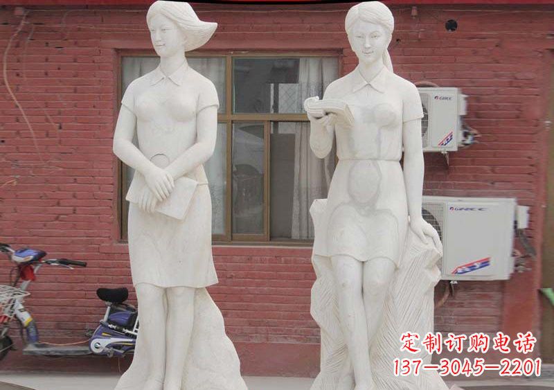 盐城校园拿书本的学生石雕